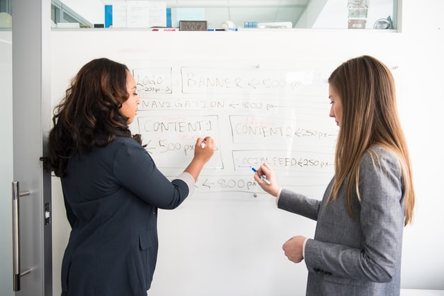 Two people talking discussing bright advice for entering the world of work