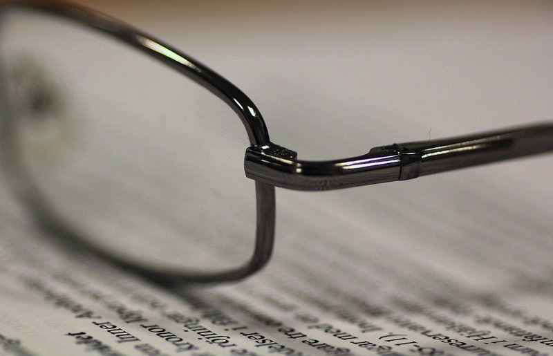 Reading glasses on a book