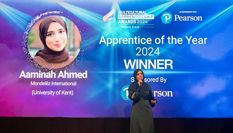 Aaminah Ahmed accepting Apprentice of the Year 2024 on stage