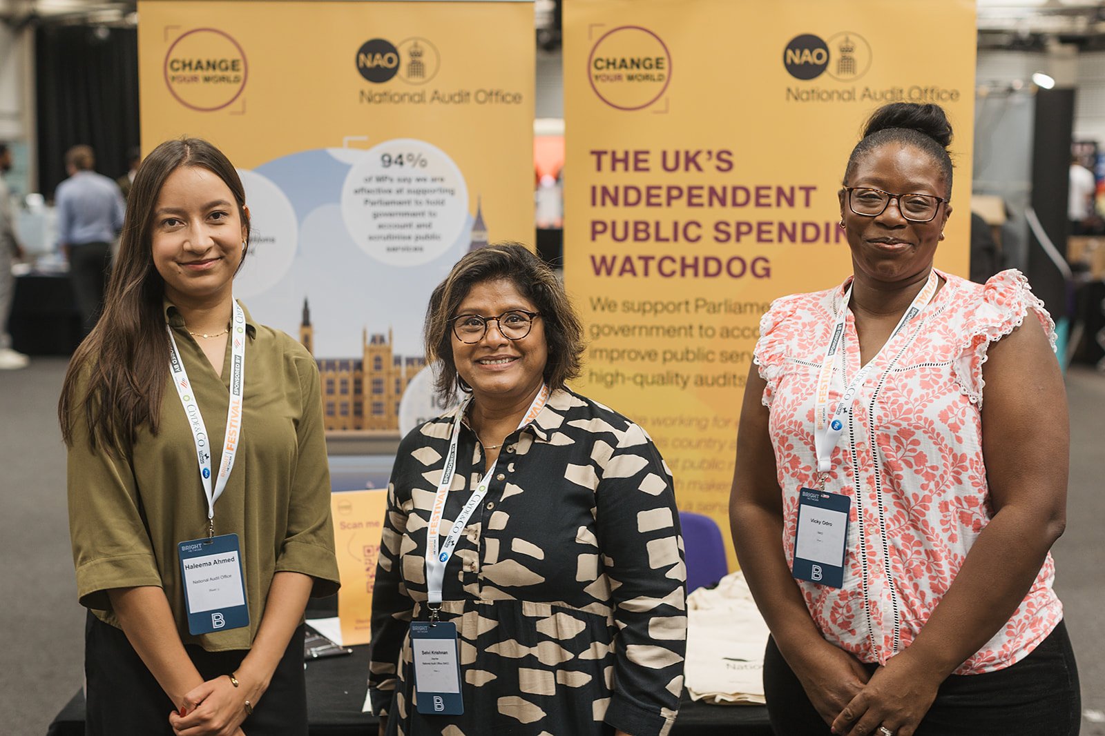 An image of three women at a recruitment event