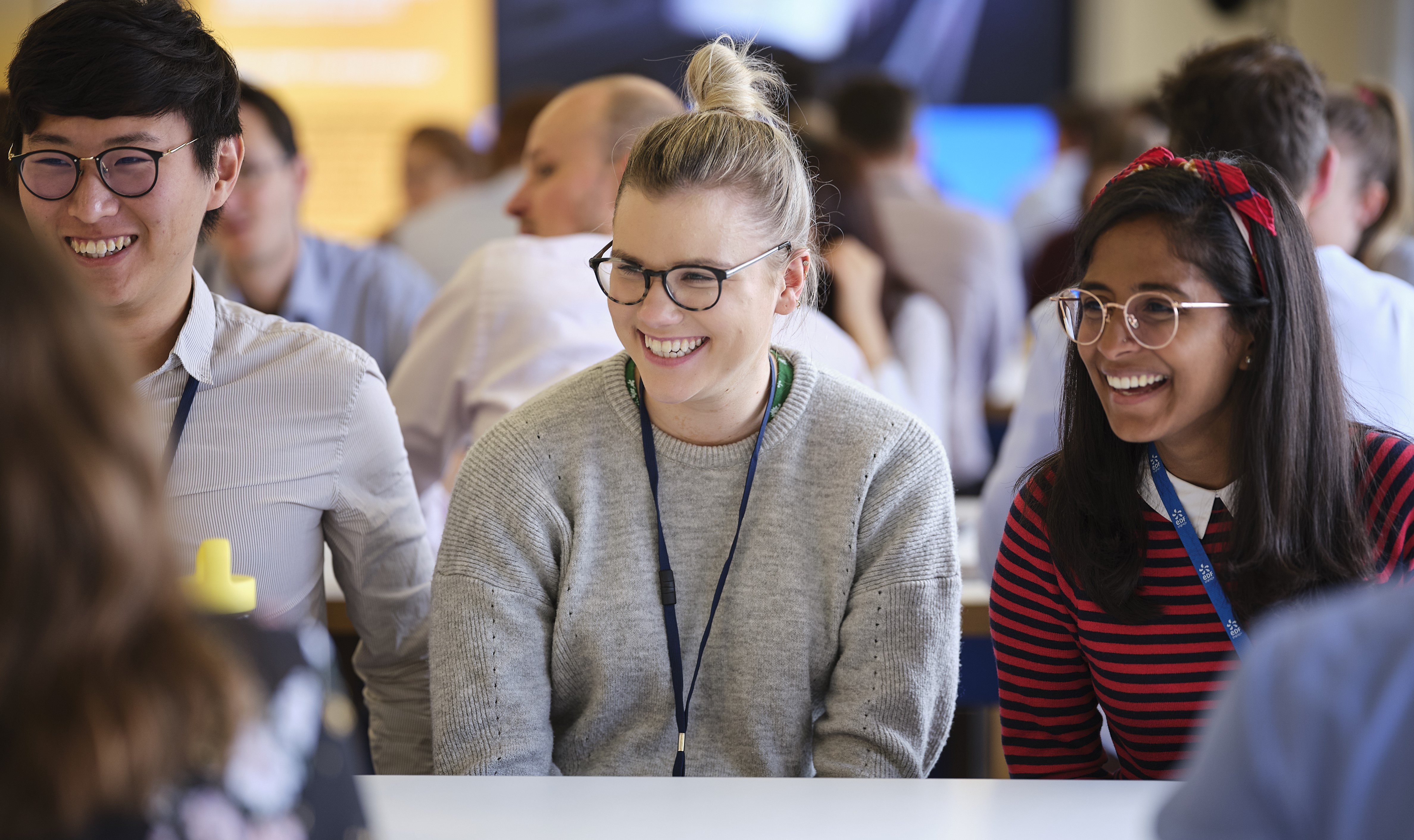 Three EDF colleagues smiling