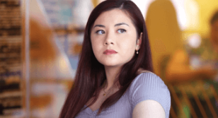 Female EDF employee looking into the distance