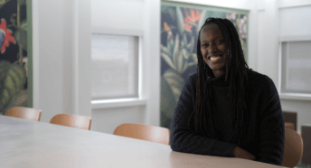Female EDF employee from the Procurement Department smiling